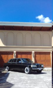 3-car-garage-mansion.-CENTRAL-AMERICA-LIMOUSINE-MERCEDES-300D-LANG.jpg